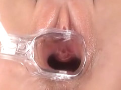Close up pussy spreading with speculum