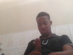 Black guy stroking his dick