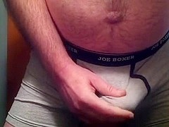 Gay masturbates in boxers and cums