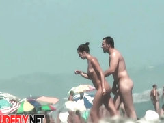 Hot girls from nudist beach shake their candid tits