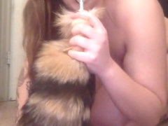 Tattooed teen plays with her creamy pussy and anal plug