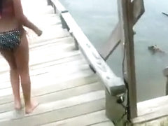 Athletic senorita took a slash on the docks