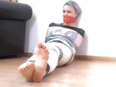 mummified girl flexes bare soles