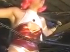 Pink haired crime fighter is chained up and gets tortured b