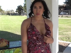 Mia Li shows off her bushy pussy in some upskirt action outside